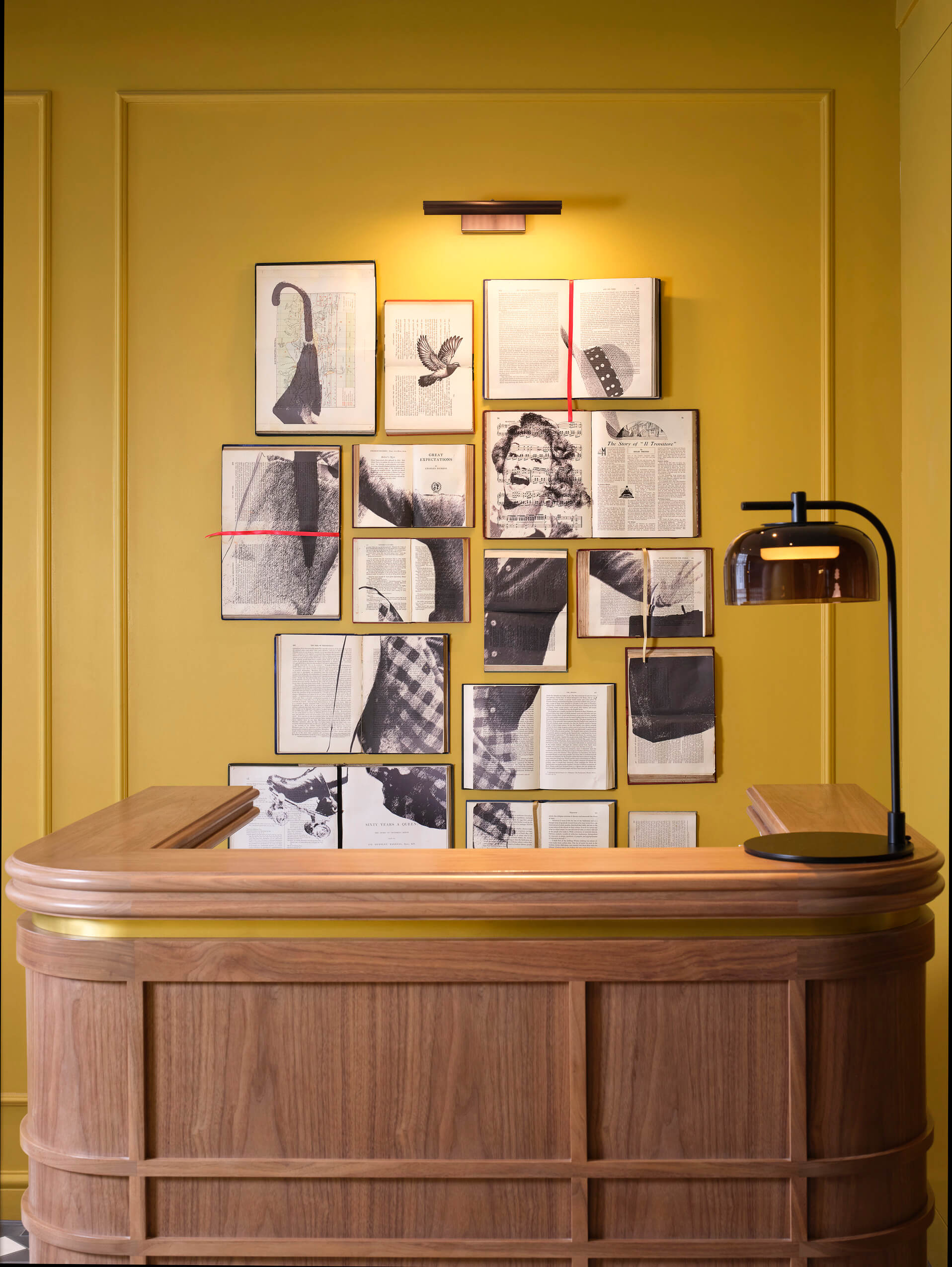 Tribute by Marriott Kensington, London reception desk with teacup ceiling installation