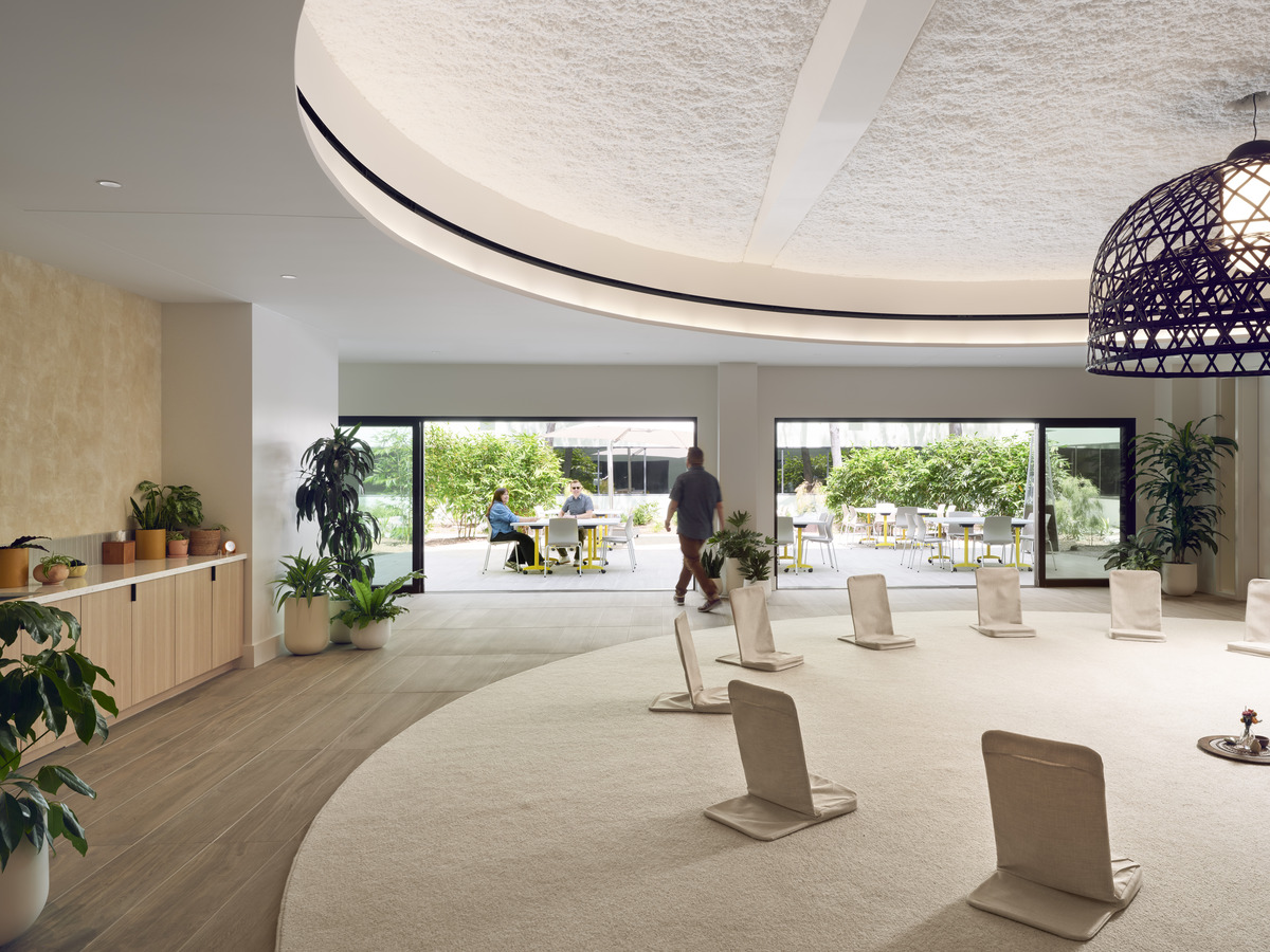 Council space with circular floor seating designed for facilitated conversation