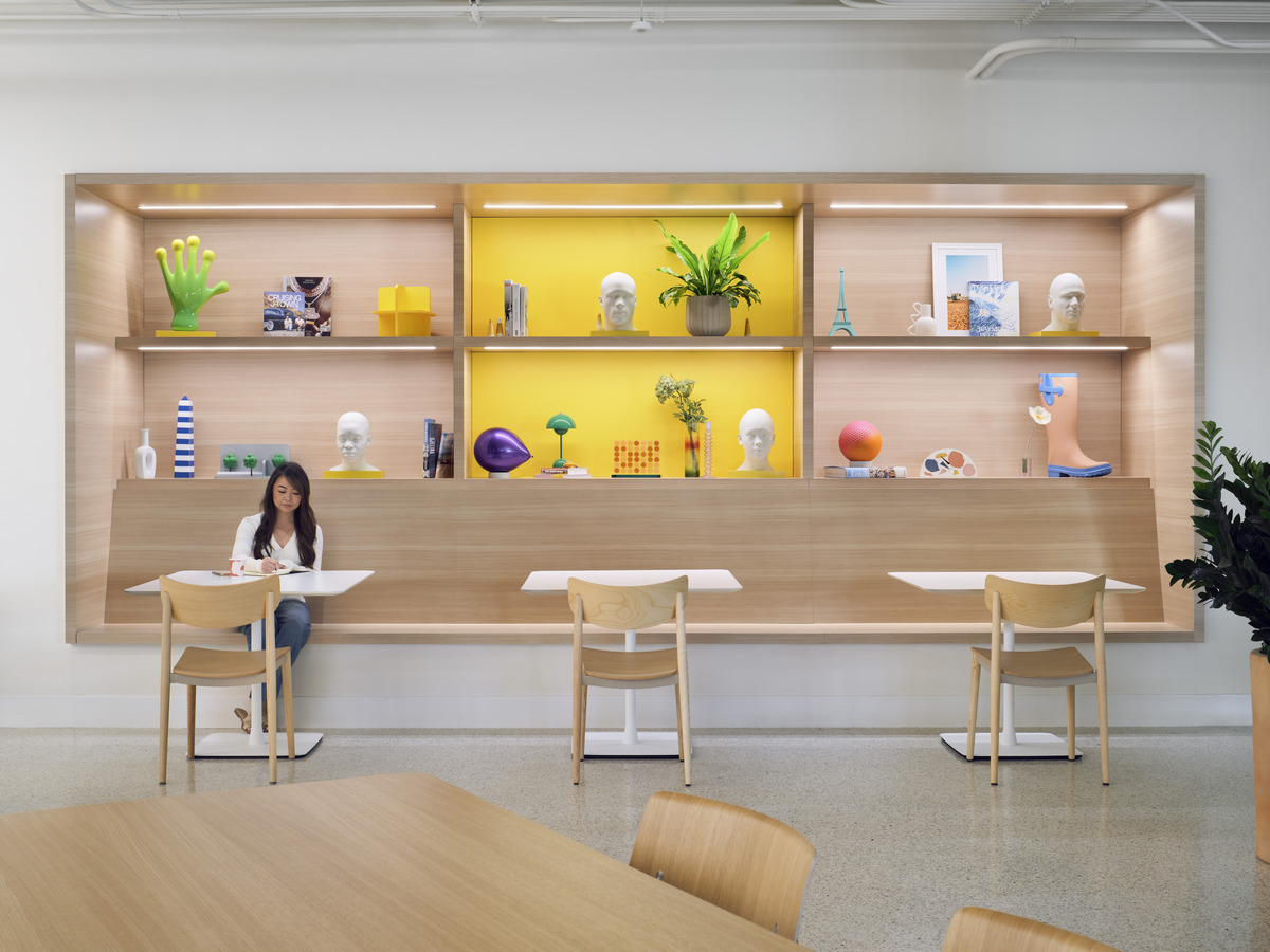 Lounge seating with purposeful moments of color marking a workplace neighborhood