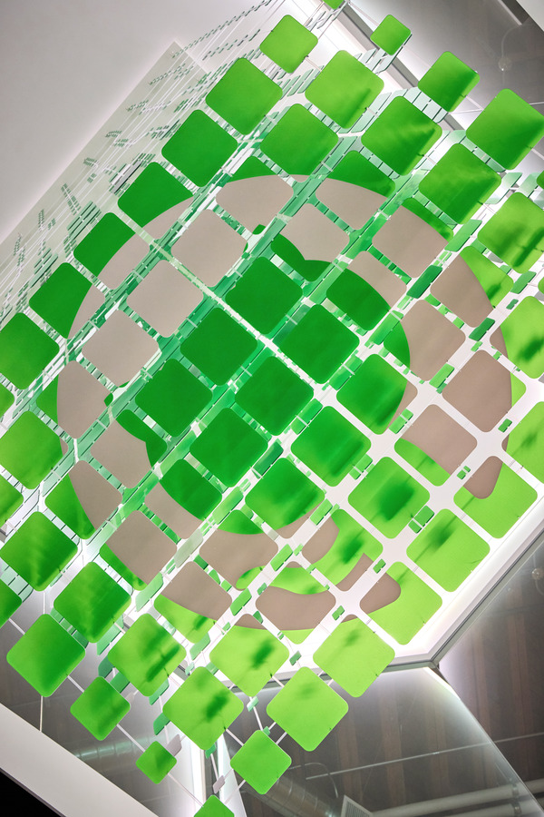 View of the installation from below, looking up through the atrium's vertical volume